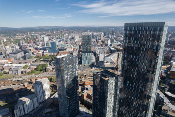 istock Manchester City Centre Drone Aerial View Above Building Work Skyline Construction Blue Sky Summer Beetham Tower Deansgate Square Glass Towers 1424590200