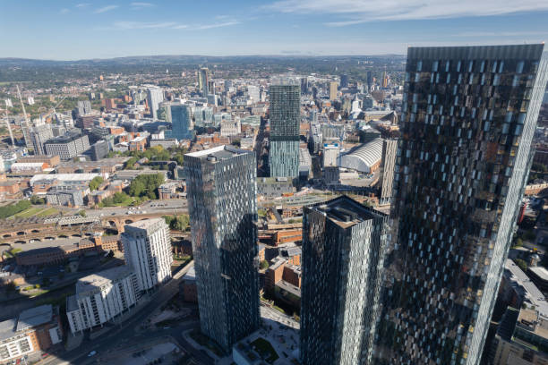 istock Manchester City Centre Drone Aerial View Above Building Work Skyline Construction Blue Sky Summer Beetham Tower Deansgate Square Glass Towers 1424590201