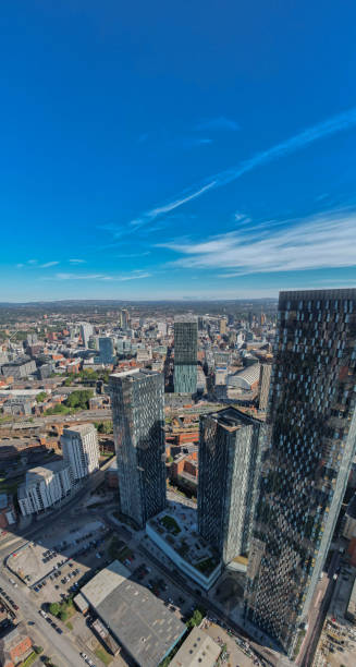 istock Manchester City Centre Drone Aerial View Above Building Work Skyline Construction Blue Sky Summer Beetham Tower Deansgate Square Glass Towers 1424590204