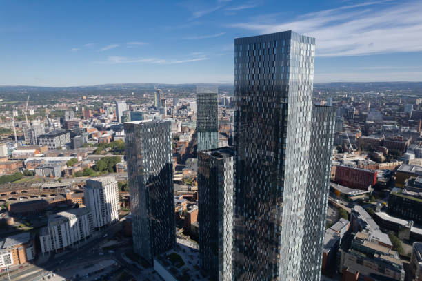 istock Manchester City Centre Drone Aerial View Above Building Work Skyline Construction Blue Sky Summer Beetham Tower Deansgate Square Glass Towers 1424590419