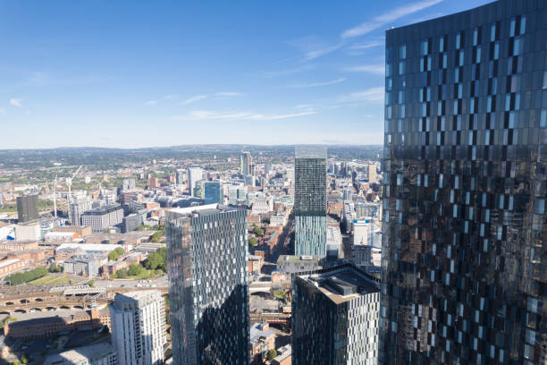 istock Manchester City Centre Drone Aerial View Above Building Work Skyline Construction Blue Sky Summer Beetham Tower Deansgate Square Glass Towers 1424590604
