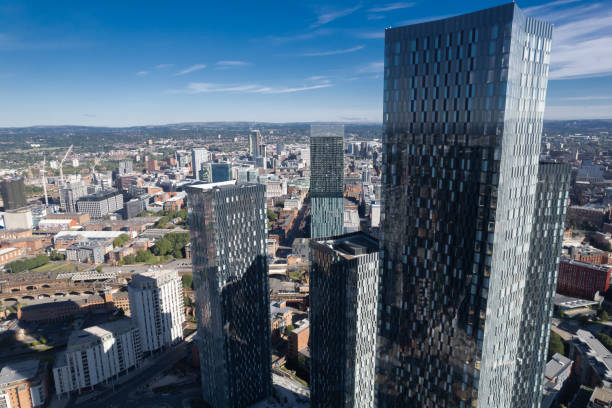 istock Manchester City Centre Drone Aerial View Above Building Work Skyline Construction Blue Sky Summer Beetham Tower Deansgate Square Glass Towers 1424590605
