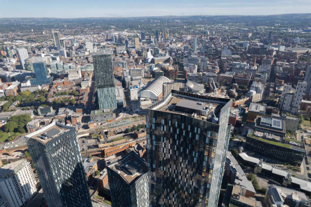 istock Manchester City Centre Drone Aerial View Above Building Work Skyline Construction Blue Sky Summer Beetham Tower Deansgate Square Glass Towers 1424590807