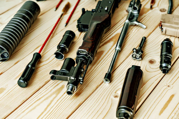 istock Gunsmith's working table for gun cleaning and maintaining 1424593668