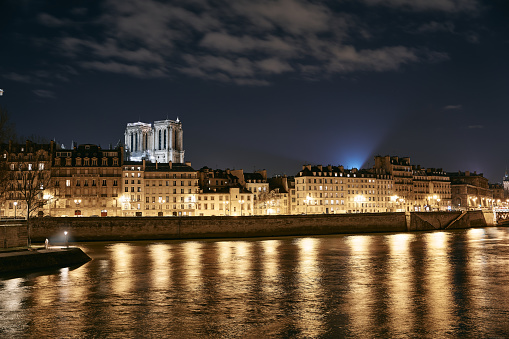 Streets and buildings of Paris on a winter night.