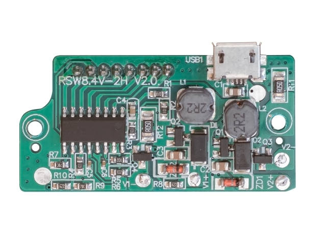 istock Small electric board for camera battery charging with micro usb port isolated on white. 1424603736
