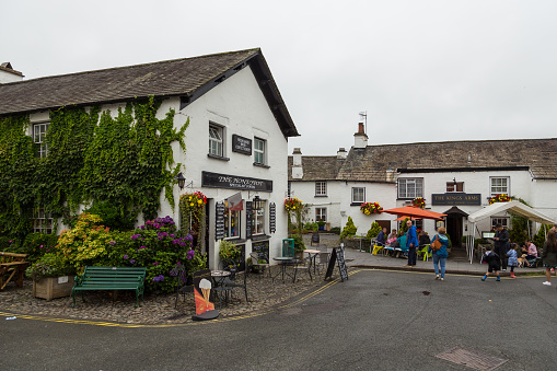 Hawkshead, Cumbria, UK, 15 August 2018 - Facade of a white buildings in the village of Hawkshead in the South Lakeland, England, UK