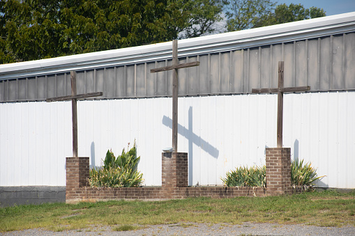 Close up of three wooden crosses
