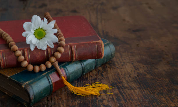 istock Zen still life with books and flowers 1424610267