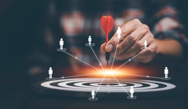 targeting the business concept, businessman touch red arrow dart to the virtual target dartboard, executive marketing, investment goal and target for business investment concept, mini home. - gelegenheid stockfoto's en -beelden