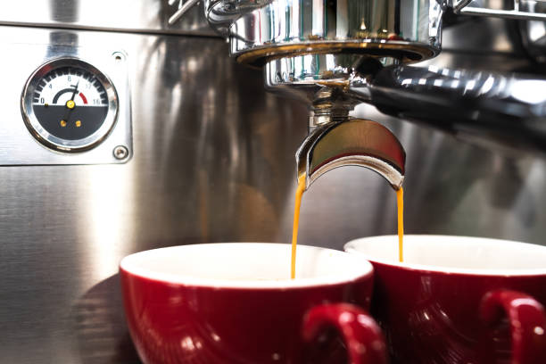 istock professional coffee maker in a small coffee shop 1424618041