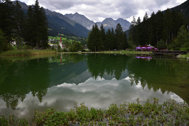 istock A small lake in the mountains 1424618149
