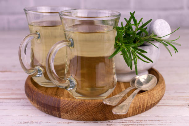istock Fresh rosemary tea. Herbal tea in a transparent cup. 1424620299