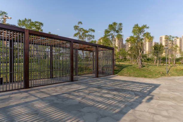 The sunlight penetrates the urban buildings with bamboo structure and forms strip shadows on the ground