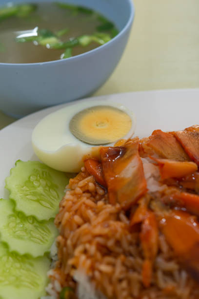 istock Red pork rice with soup 1424621546