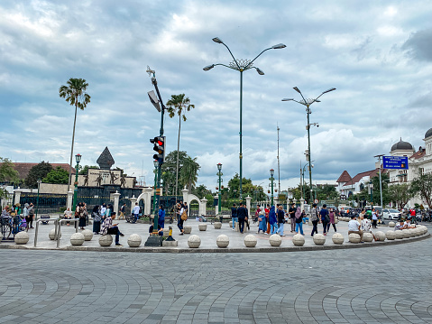 Yogyakarta, Indonesia - September 15, 2022: Malioboro street tourism is alive again with many tourists, traders and shops and the place is getting neater and cleaner.