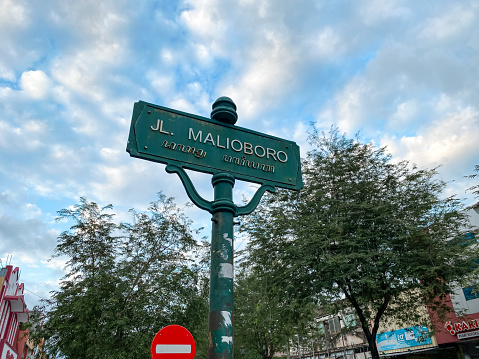 Yogyakarta, Indonesia - September 15, 2022: Malioboro street tourism is alive again with many tourists, traders and shops and the place is getting neater and cleaner