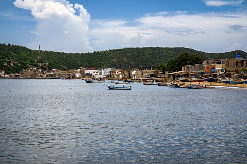 Sucre, Venezuela - August 13, 2022: Boats anchored in Cariaco dock. Sucre State, Venezuela