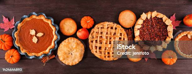 Assorted Homemade Fall Pies Top View Table Scene On A Dark Wood Banner Background Stock Photo - Download Image Now