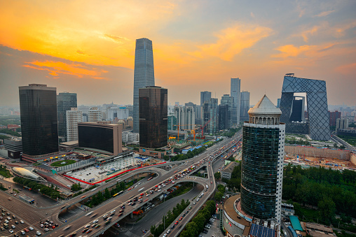 Beijing, China overlooking the central business district skyline at sunset.