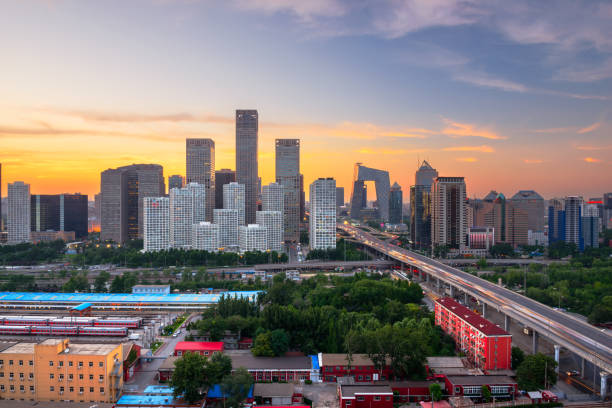 Beijing, China overlooking the central business district skyline at sunset.