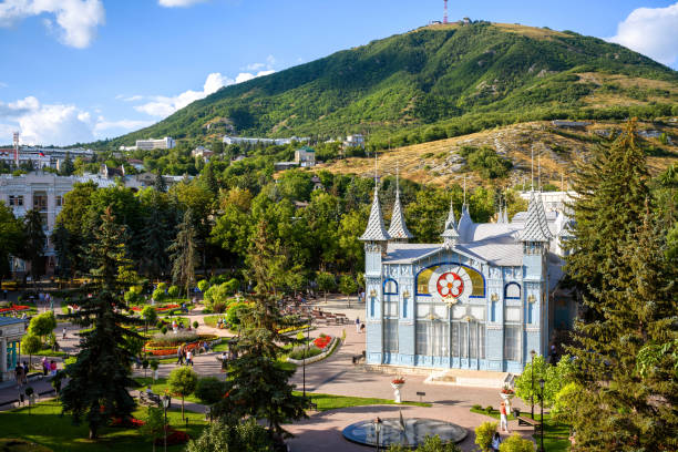 Landscape of Pyatigorsk, Stavropol Krai, Russia. View of Lermontov Gallery, historical landmark installed in 1901 Landscape of Pyatigorsk, Stavropol Krai, Russia. Scenery of park Flower Garden on Mashuk Mountain background. Scenic view of Lermontov Gallery, historical landmark of Pyatigorsk installed in 1901 caucasus stock pictures, royalty-free photos & images