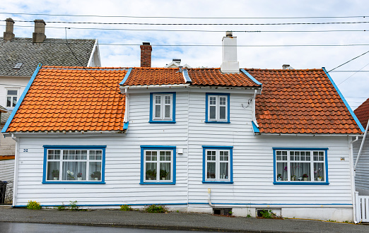 Partial view of the colorful facades of the typical buildings in front of the Nyhavn canal in Copenhagen. Urban travel