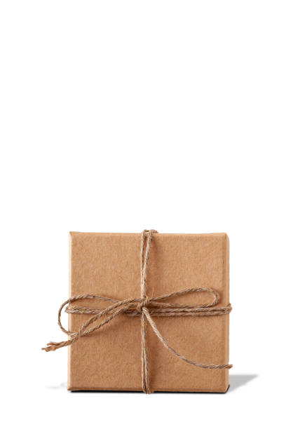 istock a gift cardboard box tied with twine stands on a white background with a shadow, copy space 1424664327
