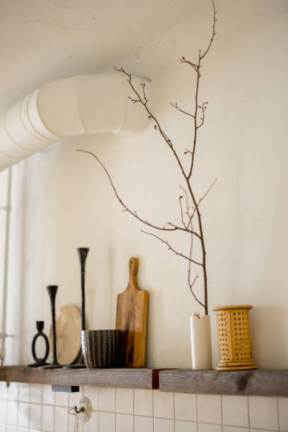 istock Wooden shelves with decoration in kitchen 1424666615