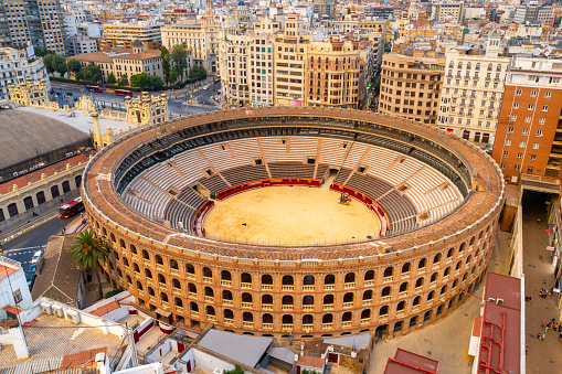 Aerial view of Valencia city, Spain at sunset with bull arena.