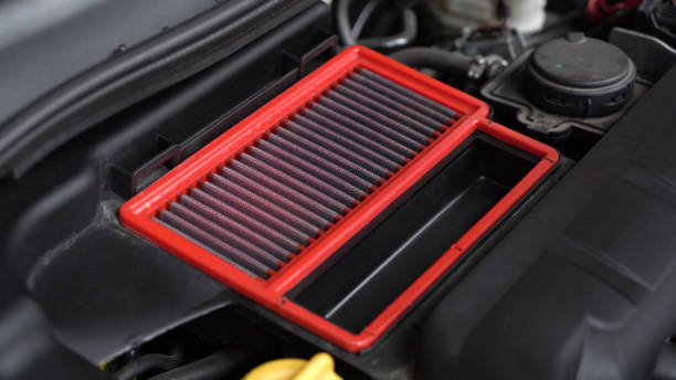 istock An auto mechanic is cleaning the engine compartment. car service. close-up. 1424692437