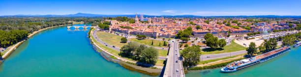 Avignon Bridge with Popes Palace and Rhone River, Pont Saint-Benezet, Provence, France. Avignon Bridge with Popes Palace and Rhone River, Pont Saint-Benezet, Provence, France. avignon france stock pictures, royalty-free photos & images