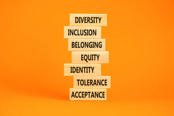 istock Diversity, inclusion symbol. Diversity belonging inclusion equity identity tolerance acceptance words on blocks. Beautiful orange table orange background. Diversity inclusion belonging concept. 1424697077