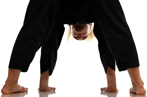 Martial artist stretching.