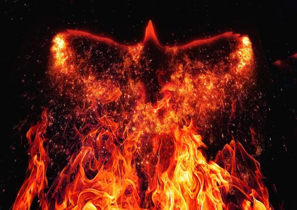 istock 3d illustration of a firebird flapping its wings in the dark 1424705723