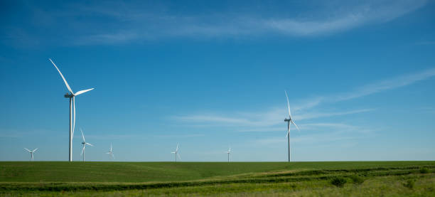 istock Wind Turbines in an Agricultural Field 1424707403