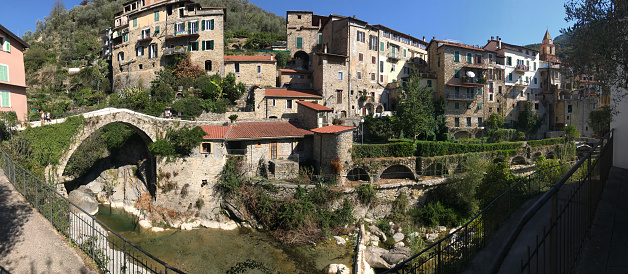Wide panorama of Rocchetta Nevina, a small ancient village of stone-made houses above the Ligurian Alps (Northern Italy), close to the borders between Italy and France.