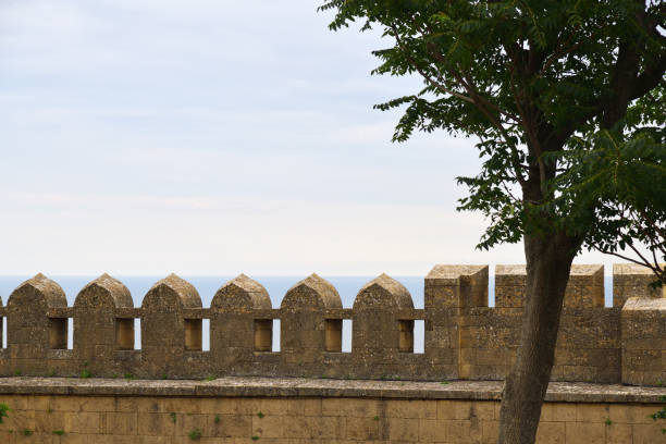Defence wall of the Naryn-Kala fortress. Caspian sea on background. Derbent. Republic of Dagestan Russia