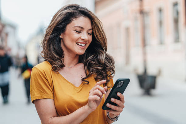 istock Woman with smartphone 1424732198