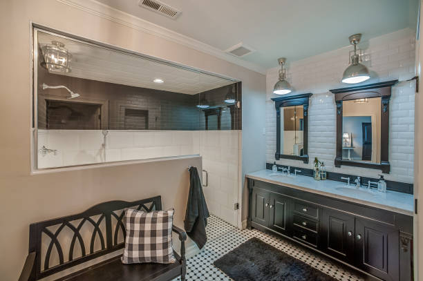 istock Gorgeous bathroom with large shower and nice bench outside the shower 1424738402