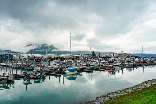 Valdez, Alaska, USA – August 25, 2022: A marina at Prince William Sound harbor in Valdez, Alaska, USA.