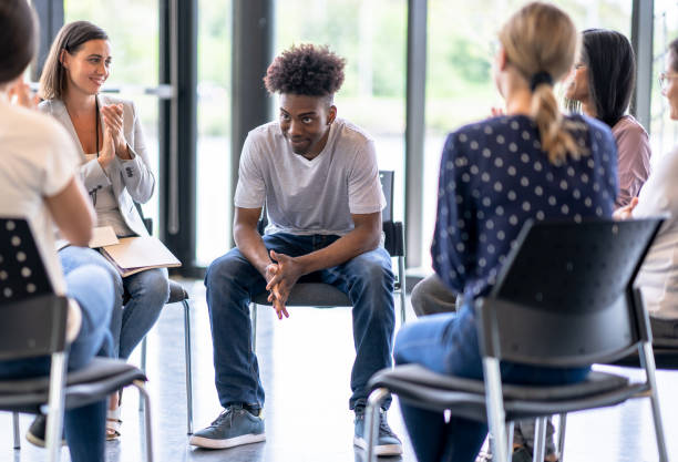 istock Young adults meet for emotional support 1424747161