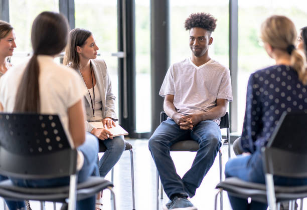 istock Young adults meet for emotional support 1424747166