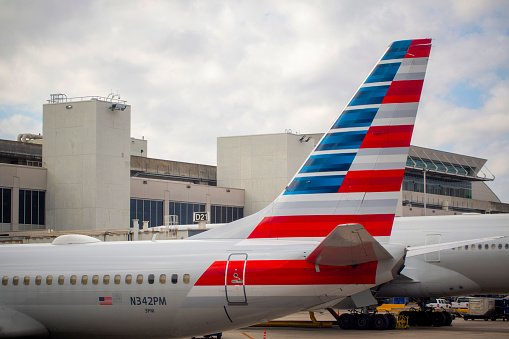 Tail of American Airlines Boeing 737-823 aircraft with registration N342PM parked at gate at Miami International Airport in January 2022.
