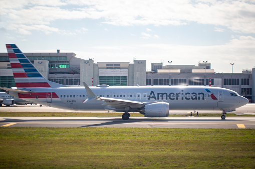 American Airlines Boeing 737-8 MAX aircraft with registration N343RY taxiing at Miami International Airport in January 2022.