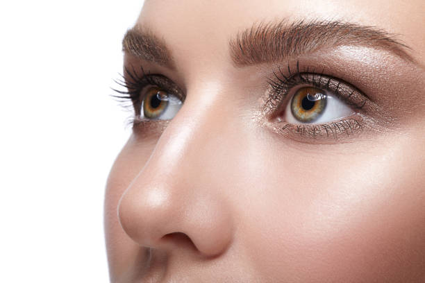 istock Female face with day makeup 1424764787
