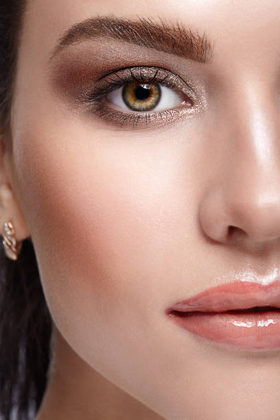 istock Half face female beauty portrait with day  makeup 1424764882