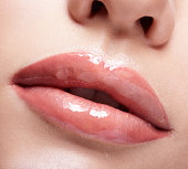 Closeup shot of female mouth with red lips