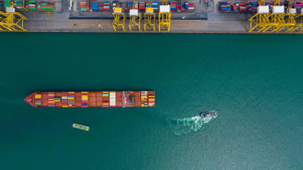 istock Container ship global business company freight shipping import export logistic and transportation by container ship, Container ship cargo freight shipping maritime transport international worldwide supply chain. 1424784316