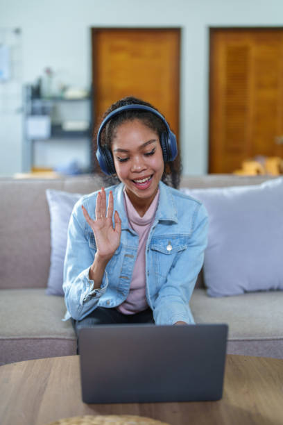 istock African American wearing headphones and a computer at a conference 1424784907